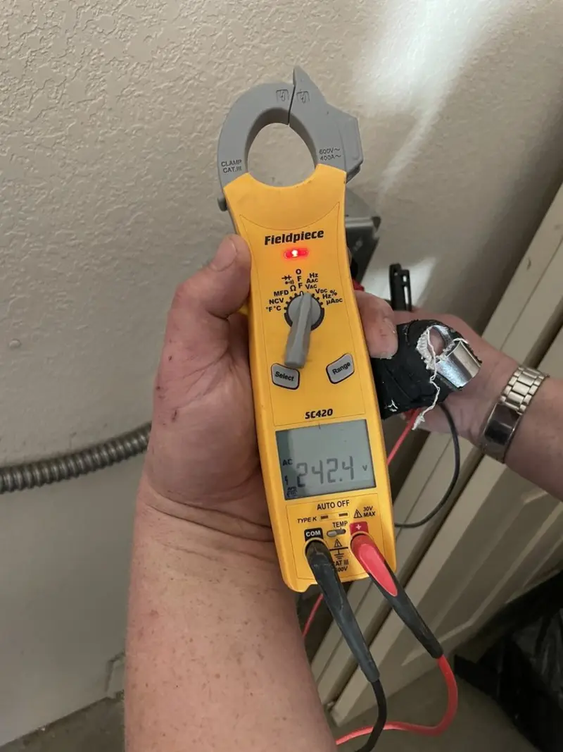 Voltage testing with clamp meter during Generator Installation in Lyndon